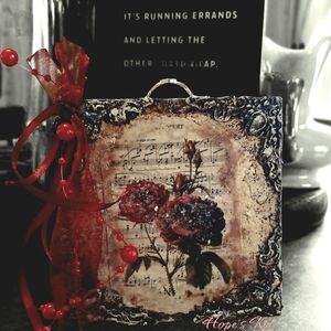 Floral Sheet Music Art with Red Accents